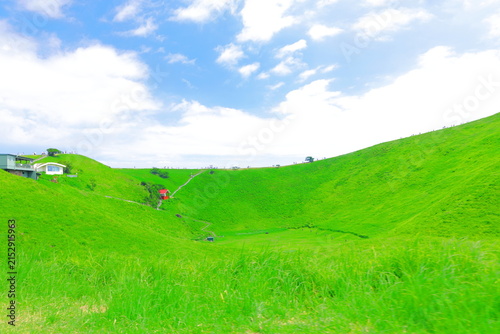 Konstfotografi Mount Omuro in Izu, Japan with lush green grass and blue sky