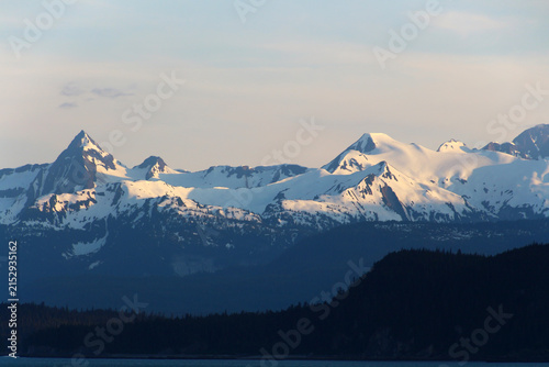 Canvas Print Snow capped mountains along the coast of Favorite Channel, Alaska, United States
