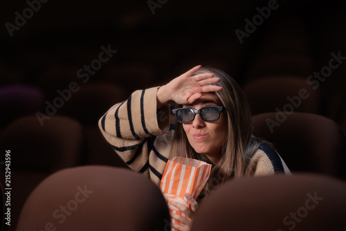 Fotografía Uncomfortable Woman Wearing 3D Glasses Watching Intense Cinema Movie