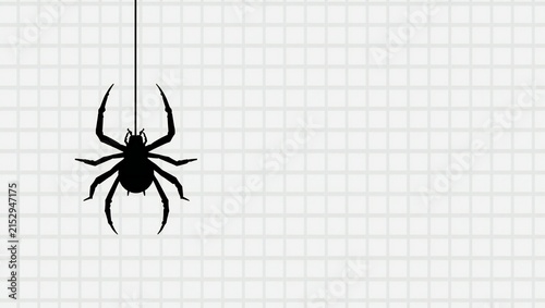 A scary black spider hanging on a single silk thread against a light tiled pattern background