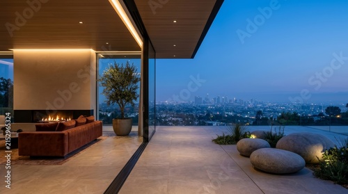 Sleek living room featuring a cozy fireplace and plush sofa overlooking a city skyline.