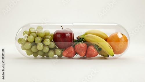 Assorted fresh fruits in a clear glass container