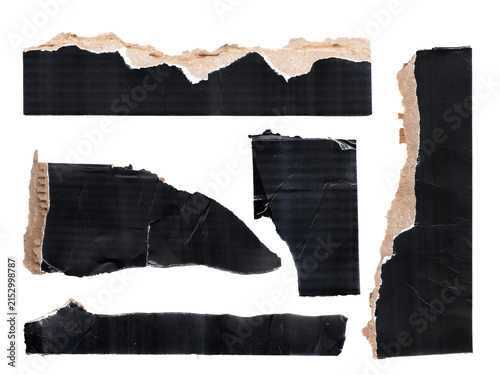 Set of torn black cardboard paper strips with rough ripped edges on transparent background