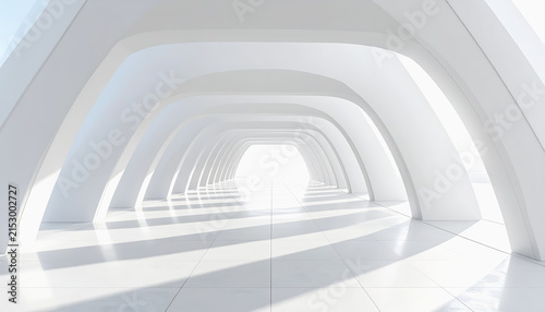 Modern white architectural tunnel with archways and sunlight casting shadows on the floor