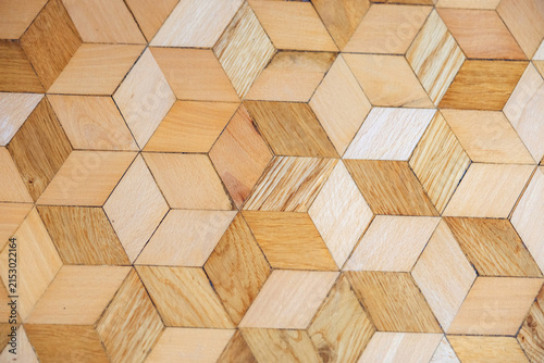 Handmade geometric wooden flooring with natural wood texture