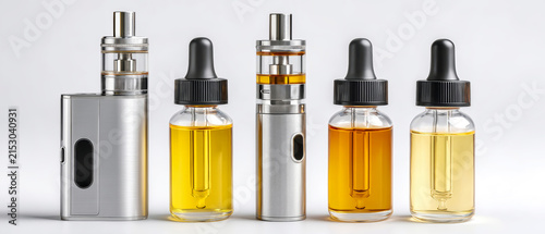 Several vape devices and bottles of e-liquid are lined up on a table, showcasing different colors and sizes in a clean, bright area