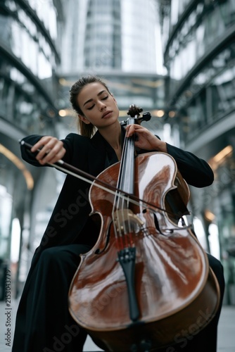 Urban Cellist Playing Passionately