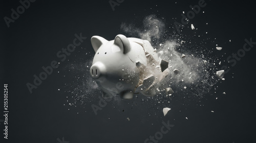 Broken piggy bank shatters into pieces symbolizing economic challenges and recession impact on savings and financial stability in dark background