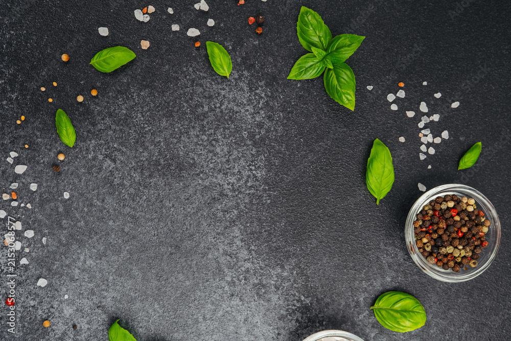 Fototapeta premium Food ingredients with place for text on dark background