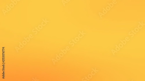 Minimalist abstract gradient background blending deep charcoal brown into vibrant burning orange