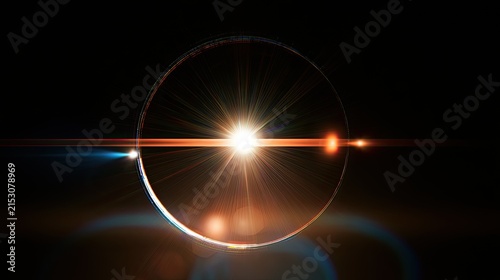 Bright celestial ring with lens flares and glowing orb against black