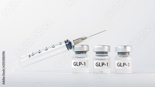 Fotografie Medical weight loss injection syringe vial, GLP treatment concept with glass bot