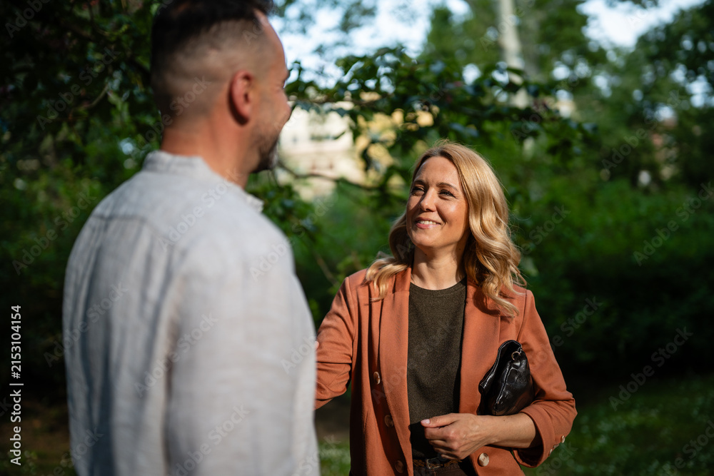 Fototapeta premium Kaja kallas engaging in outdoor park conversation