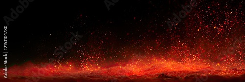 Intense, glowing embers and fiery particles erupting against a dark backdrop
