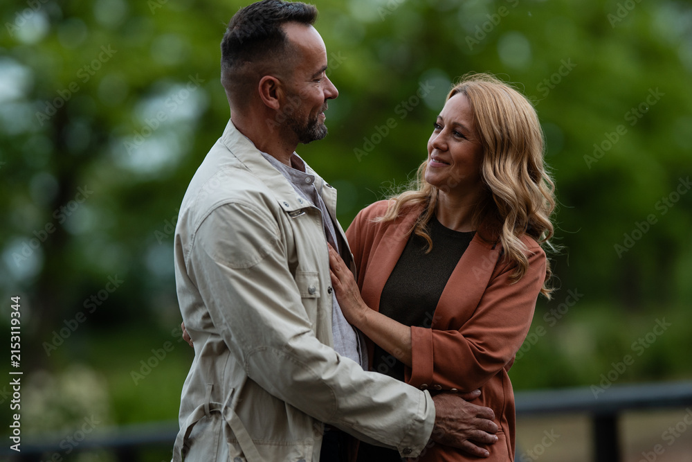 Fototapeta premium Couple expressing affection and happiness outdoors