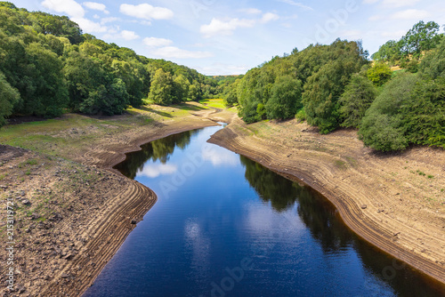 Obraz na płótnie Leighton Reservoir near Masham in North Yorkshire showing exceptionally low water levels during the prolonged hot and dry summer of 2026