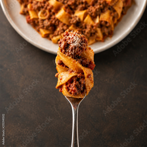 Pappardelle Pasta with Rich Meat Ragù Bolognese on Fork