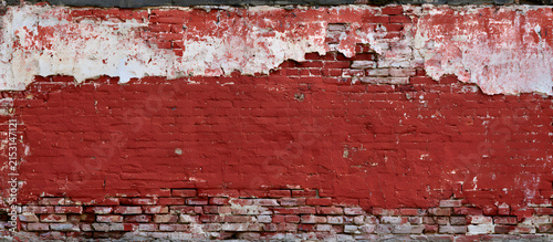 A weathered, decrepit brick wall adorned with a worn, red stonewall, creating an untidy facade with cracked plaster, serves as an ideal backdrop for a minimalist web banner with text and image areas.