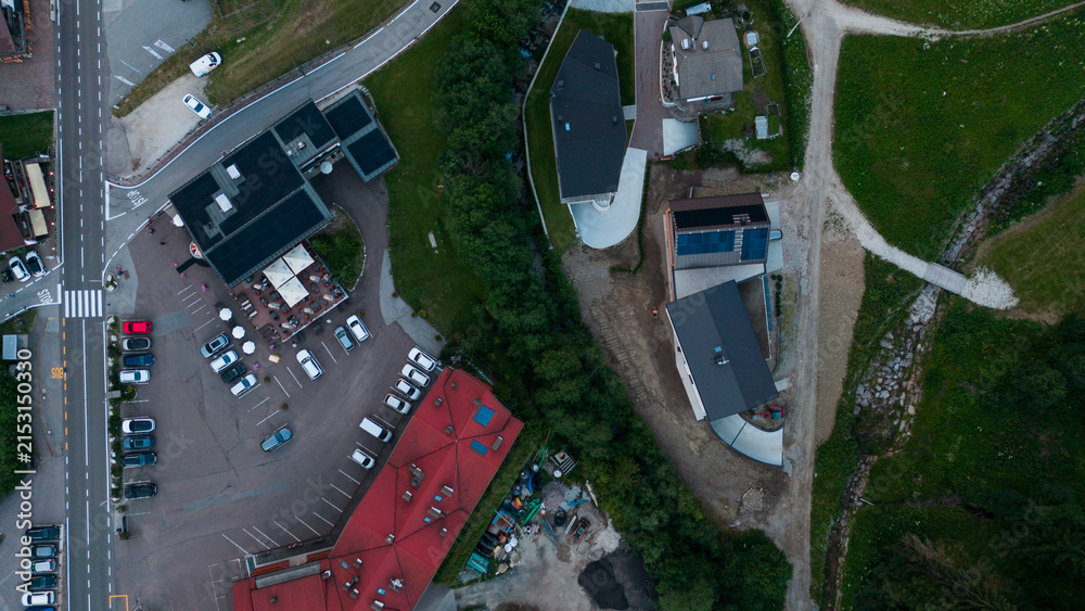Obraz premium Aerial view of rural road, road junction in a mountain village