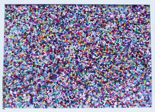 Colorful seed beads and craft beads close up