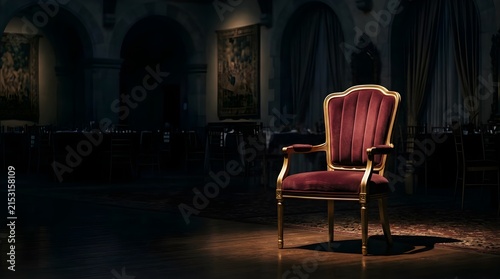 Elegant velvet armchair in a dimly lit classic banquet hall interior