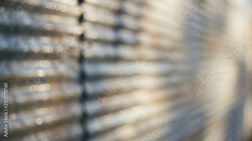 Abstract Bokeh Background with Soft Golden Light and Blurred Horizontal Lines Pattern