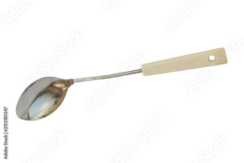 Large metal spoon with white plastic handle for cooking food outdoors. Isolate on white background. Vintage kitchen tool. Kitchen gadget. Old spoon.