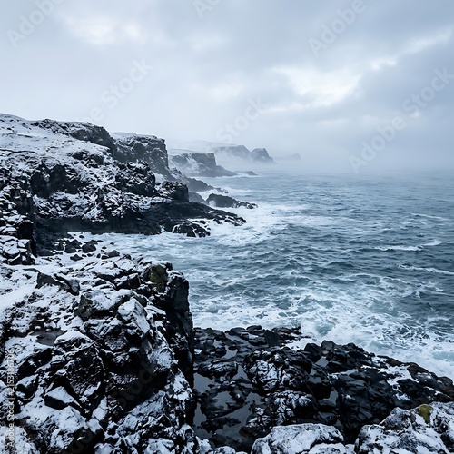 Snow Covered Coastal Cliffs Meeting Waves Under Cloudy Sky