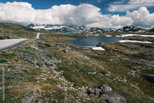 Картината върху платно Panoramic vista of the desolate arctic tundra landscape dotted with glacial tarn