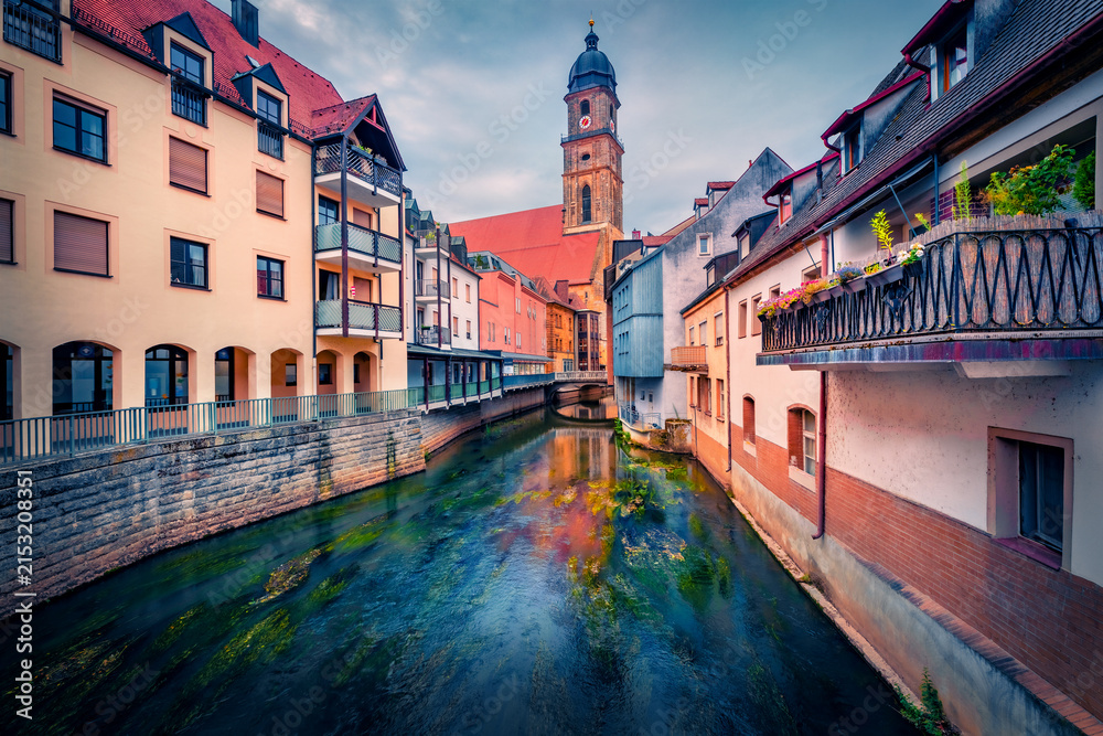 Fototapeta premium Marvelous summer cityscape of Amberg - town in Bavaria, Germany, Europe. Superb morning view of bell tower of Basilika Sankt Martin and old colorful buildings on the shore of Vils river. 