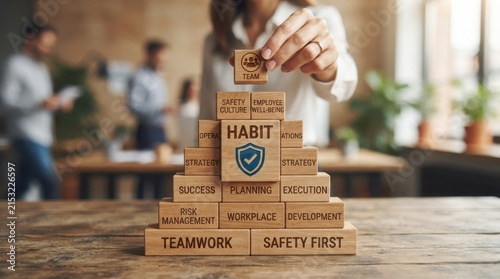 Stack of cardboard boxes with teamwork and safety messages