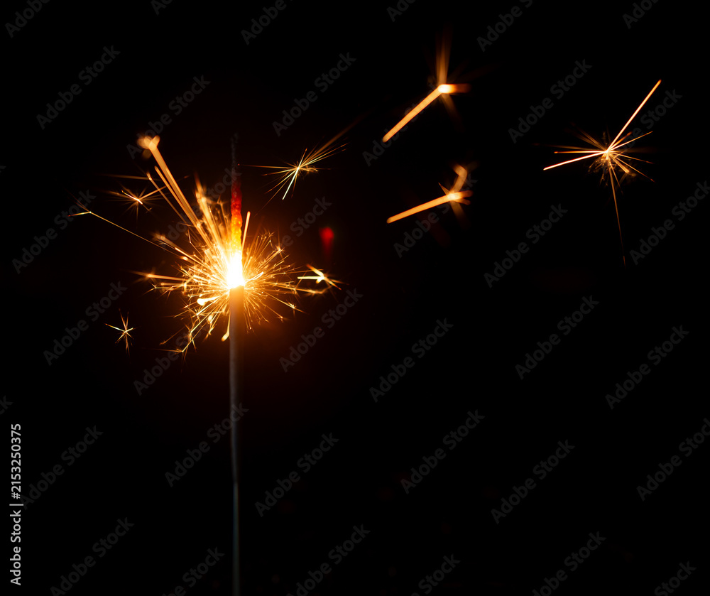 Fototapeta premium Light a Sparkler for fun in festival on black background