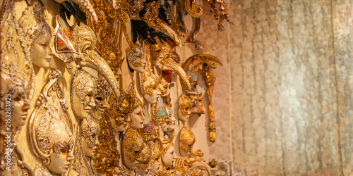 The majestic splendor of ancient Venetian masks decorated in gold and precious velvet