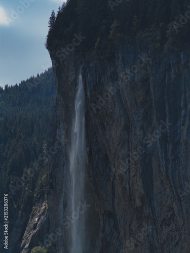 Canvastavla Dramatic Waterfall Plunge Down Steep Cliff Face with Lush Green Forest