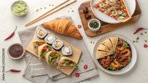 Fusion of sweet and savory dishes on a rustic tabletop with inspired ingredients and flavors