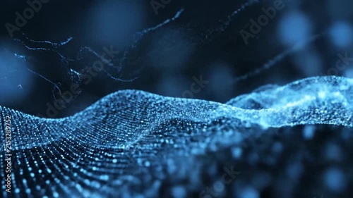 Digital wave of glowing blue particles flowing smoothly in dark background with slow camera movement for futuristic technology visuals