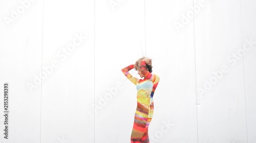 Vibrant and Fashion Forward Colorful Dress Worn by Model Showcased Against a Neutral Background