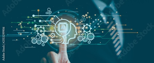 Hand taps glowing AI icon. Digital gears spin around brain symbol. Light trails connect technology and thought. Businessman stands behind futuristic display