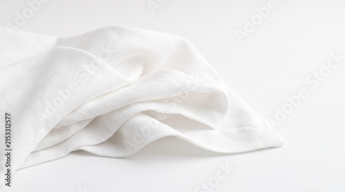 White linen fabric texture, crumpled soft cotton cloth on white background, elegant draped textile material for home decor