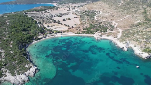 Aerial Drone Shot of Crystal Clear Turquoise Cove with Rocky Coastline in Urla Izmir Turkey