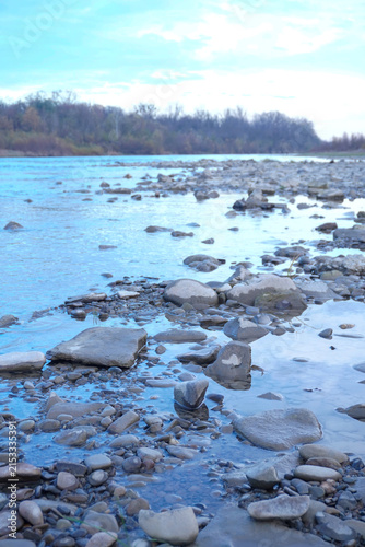 Photography Shallow Rocky Riverbank with Stones and Calm Water near Chernivtsi Ukraine
