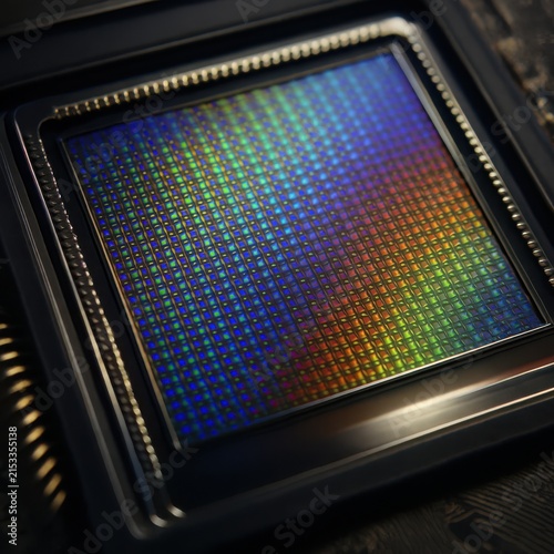 Close up view of a silicon optoelectronic photo sensor element with micro lens array grid