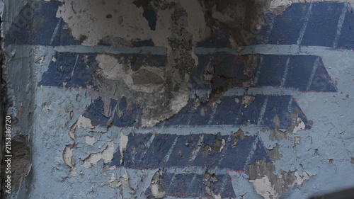 Peeling Blue Paint and Weathered Wall Texture