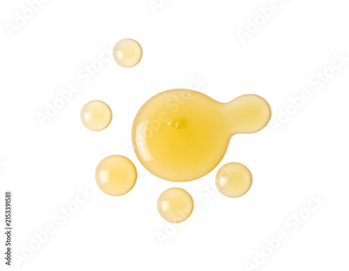 Ginger Juice Drops Isolated on White