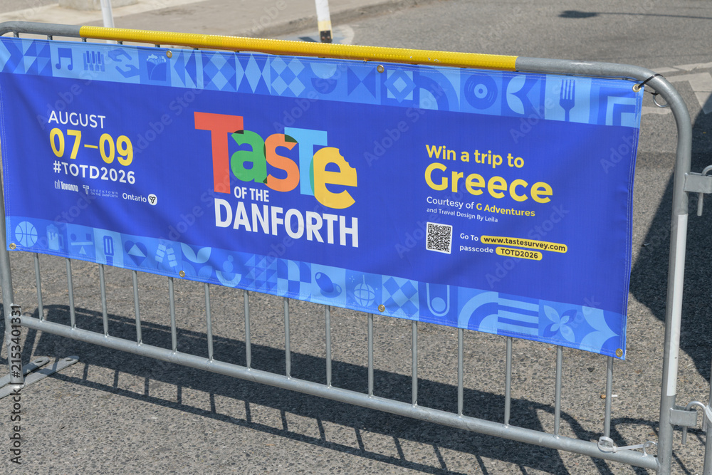 Fototapeta premium barrier fence and banner at TOTD 2026, community-based street festival, Toronto