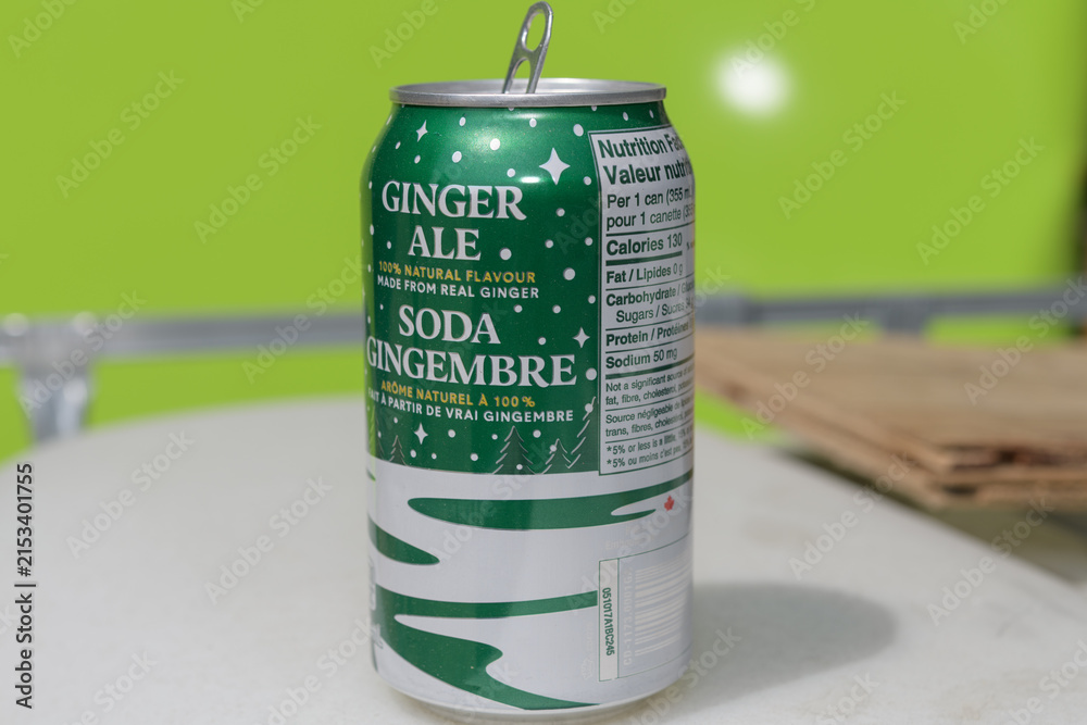 Fototapeta premium holiday/winter seasonal branding on a discarded aluminum can of Canada Dry in Toronto, summertime