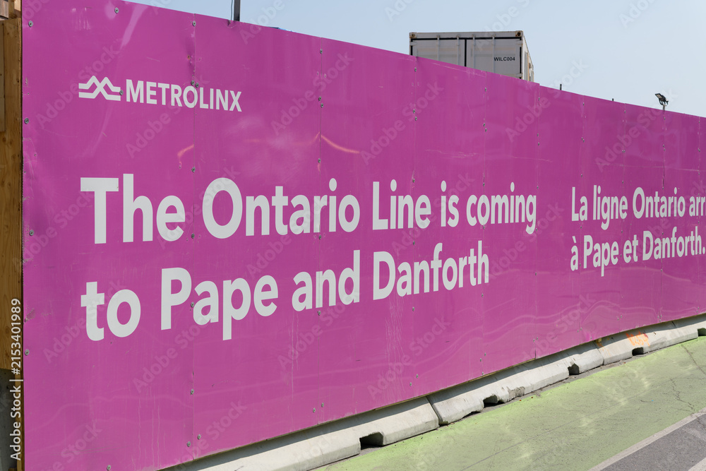 Fototapeta premium Metrolinx construction hoarding at the Ontario Line station, Pape and Danforth, Toronto