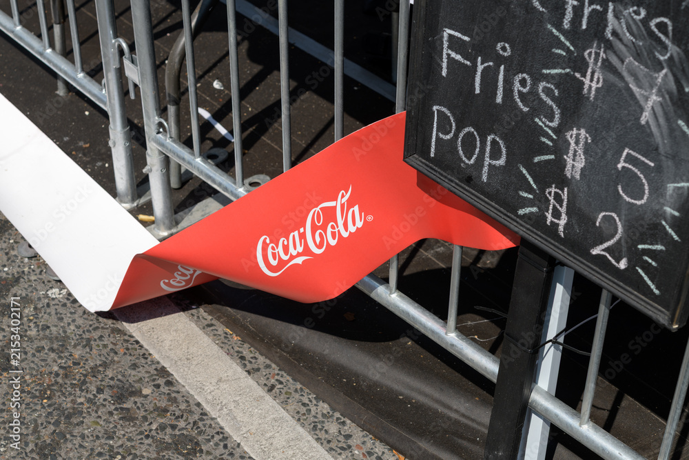 Fototapeta premium chalkboard with drink menu and a Coca-Cola banner in Toronto