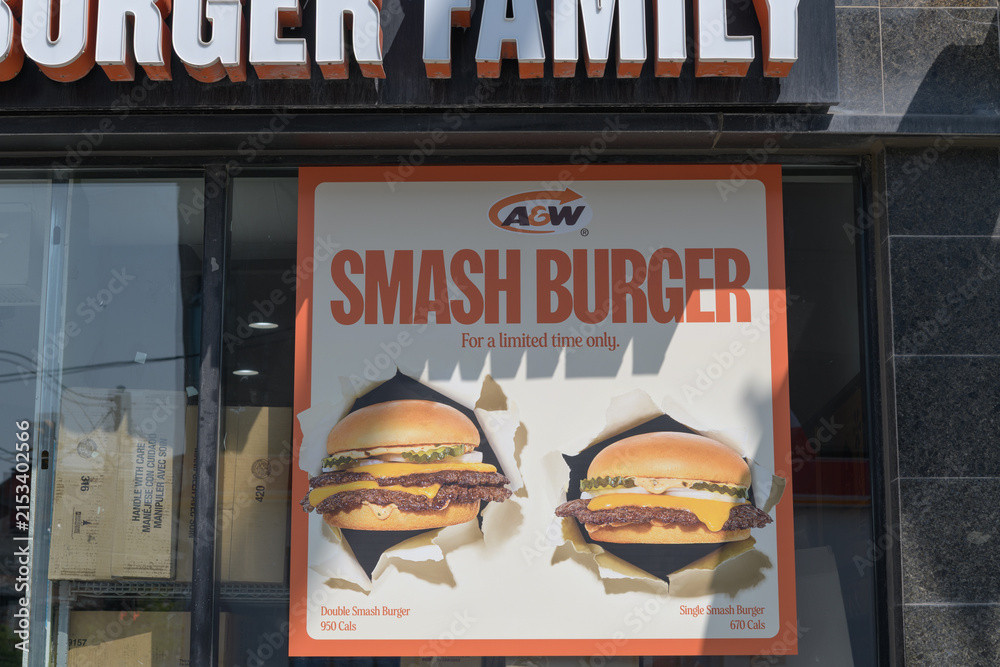 Fototapeta premium sign in window at A&W Canada, a hamburger restaurant located at 654 Danforth Av, Toronto (Smash Burger)