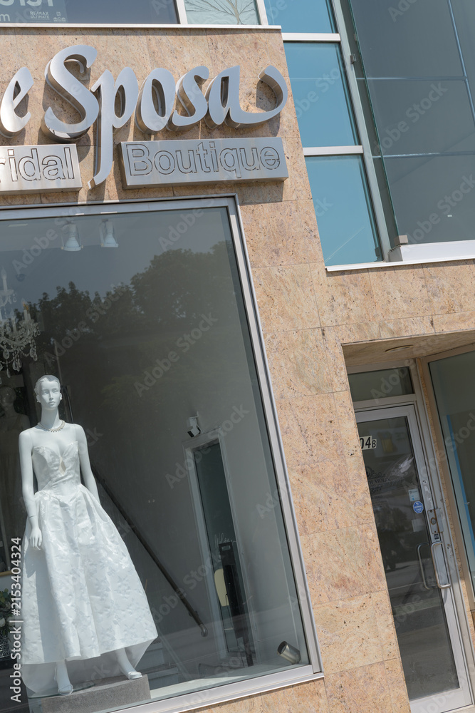 Fototapeta premium Vogue Sposa Bridal Boutique facade and mannequin in display window at 304 Danforth Av, Toronto